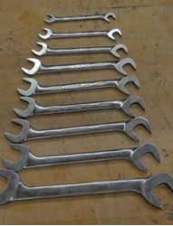 Picture of Snap-on 9 Piece Standard 4-way Angle Open End Wrench Set 10MM-27MM  1)27MM VSM5227B USA 2)22MM VSM5222B USA  3) 21MM VSM5221B USA 4)19MM VSM5219B  USA 5)18MM VSM5218B USA 6)17MM VSM5217B USA 7)14MM VSM5214B USA  8)12MM VSM5212B USA 9) 10MM VSM5210B USA USED. TESTED. IN A GOOD WORKING ORDER. 