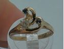 Picture of 14KT YELLOW GOLD RING 2.7 GR W ROUND DIAMOND 0.15PTS & 2 ROUND SAPPHIRES SIZE 5 .  PRE OWNED. VERY GOOD CONDITION. 825182-1.