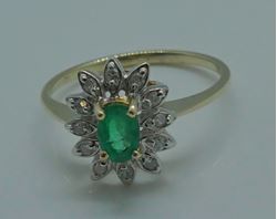 Picture of 14KT YELLOW GOLD FASHION RING SIZE 6.5 2.8 GRAMS WITH EMERALD OVAL STONE AND 12 ROUND DIAMONDS.  PRE OWNED. VERY GOOD CONDITION. 851806-1.