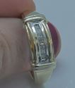 Picture of 10KT YELLOW GOLD MEN'S RING SIZE 10.75 ;6.5 GRAMS;7 PRINCESS CUT DIAMONDS 0.25 CARAT.  PRE OWNED. VERY GOOD CONDITION. 851900-1.