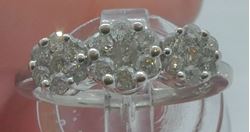 Picture of 14kt white gold ring with 0.75 carat of  round diamonds; 3.7 grams; size 7.5 mint condition. 