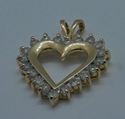 Picture of 14kt yellow gold heart pendant with round diamonds ( 1 carat ) 3.6 grams . pre owned. very good condition. 775406-5.