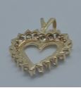 Picture of 14kt yellow gold heart pendant with round diamonds ( 1 carat ) 3.6 grams . pre owned. very good condition. 775406-5.