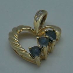 Picture of 10kt yellow gold heart pendant with 3 small diamonds and blue stones 2.4 grams  849283-3