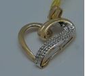 Picture of 10kt yellow gold heart pendant with 0.25 pts of diamonds 2 grams 840537-2