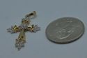 Picture of 10kt yellow gold pendant cross 2.5 grams with 0.15pts of diamonds 848865-1