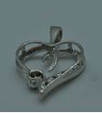 Picture of 10kt white gold heart pendant with 12 round diamonds 1.1 grams 828217-1