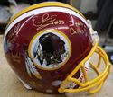 Picture of WASHINGTON REDSKINS SIGNED TEAM REPLICA NFL HELMET WITH COA COLLECTIBLE.  VERY GOOD CONDITION. 