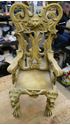 Picture of Vintage small chair 21"  with lion heads  good condition. not sure what it made of. some kind of plaster material. please look at all the pictures. 