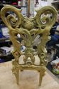 Picture of Vintage small chair 21"  with lion heads  good condition. not sure what it made of. some kind of plaster material. please look at all the pictures. 